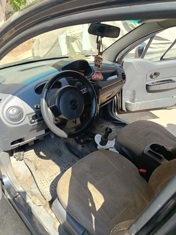 شيفروليه سبارك 2010 بيز لاين أسود مانيوال — مستعملة