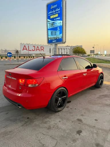 كيا سيراتو 2010 الفئه التالته أحمر أوتوماتيك — مستعملة - 2