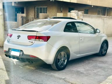 كيا سيراتو 2011 الفئه التالته أبيض أوتوماتيك — مستعملة - 2