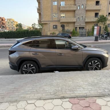 هيونداي توسان NX4e 2022 بلاك ديموند برونزي أوتوماتيك — مستعملة - 4