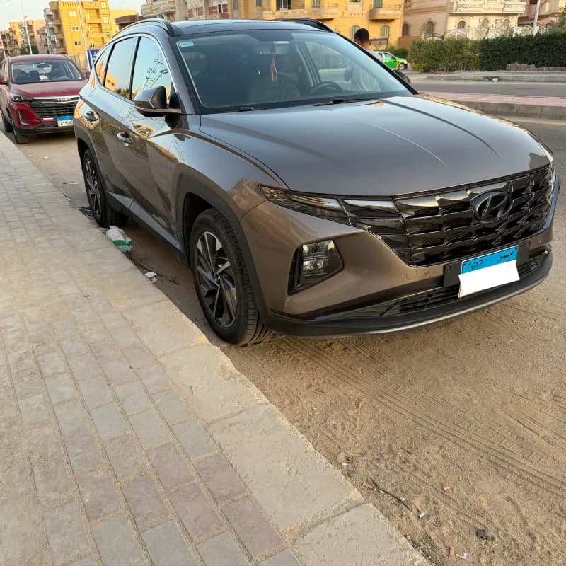 هيونداي توسان NX4e 2022 بلاك ديموند برونزي أوتوماتيك — مستعملة