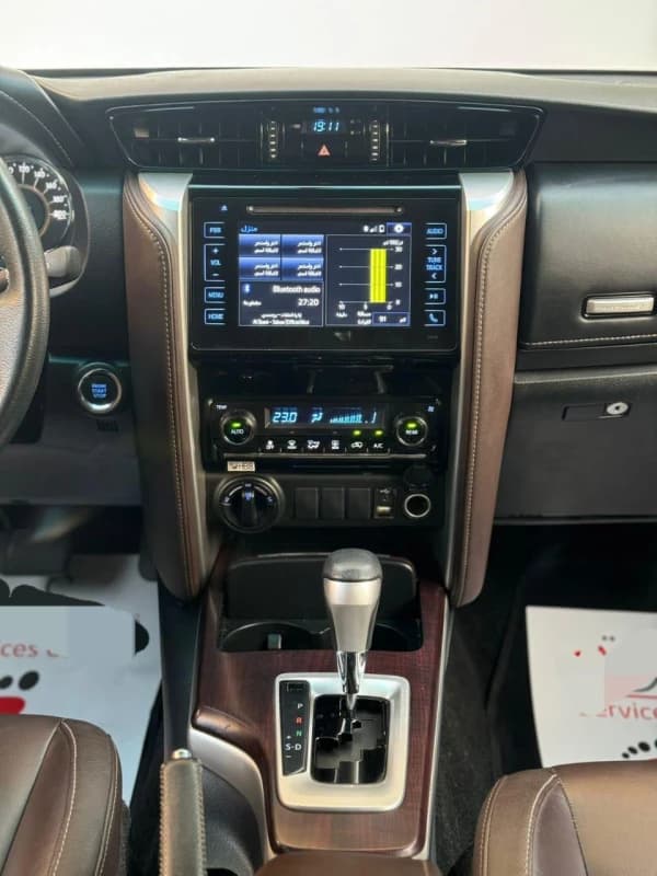 Toyota Fortuner 2021 بيج موتور 4000 أبيض أوتوماتيك — مستعملة