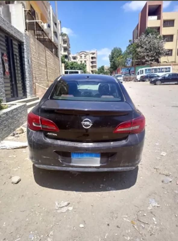 أوبل استرا 2013 اينجوي بنفسجي أوتوماتيك — مستعملة