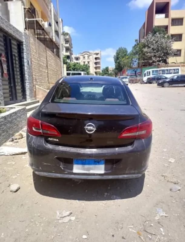 أوبل استرا 2013 اينجوي بنفسجي أوتوماتيك — مستعملة