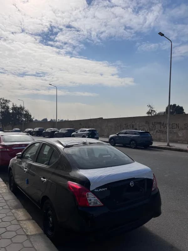 نيسان صني 2026 اول فئه أسود أوتوماتيك — جديدة