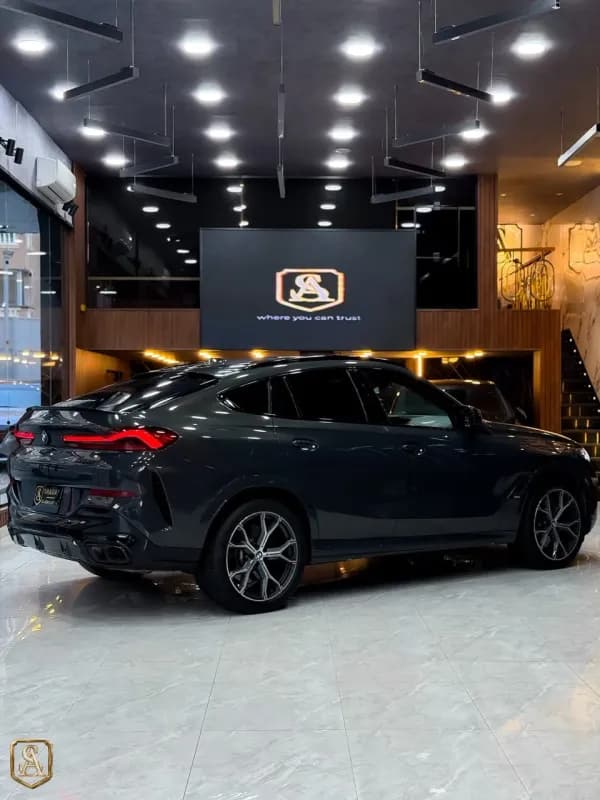 بي ام دبليو X6 2024 ام 60 اي اكس درايف رمادي قابض مزدوج — مستعملة