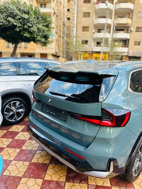بي ام دبليو X1 2024 بريفورمنس ام رمادي إسمنتي أوتوماتيك — جديدة