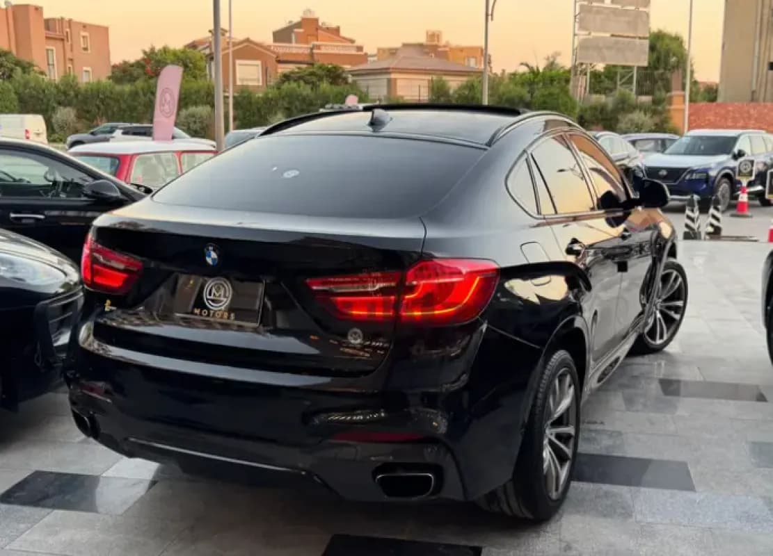 بي ام دبليو X6 2018 ام 40 اي أسود أوتوماتيك — مستعملة