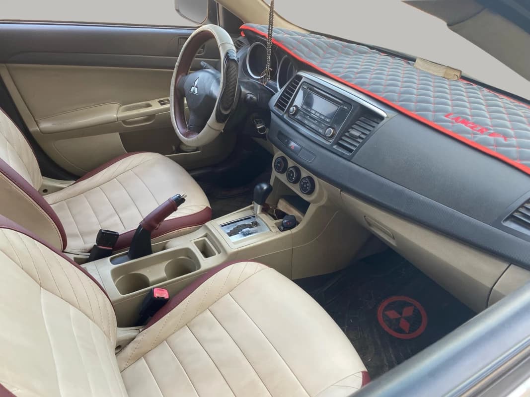 Mitsubishi Lancer 2015 هاي لاين أبيض أوتوماتيك — مستعملة