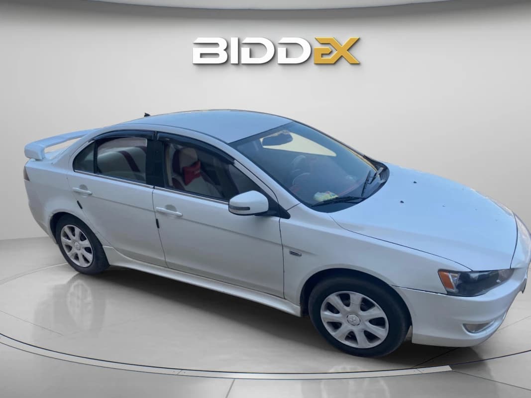 Mitsubishi Lancer 2015 هاي لاين أبيض أوتوماتيك — مستعملة