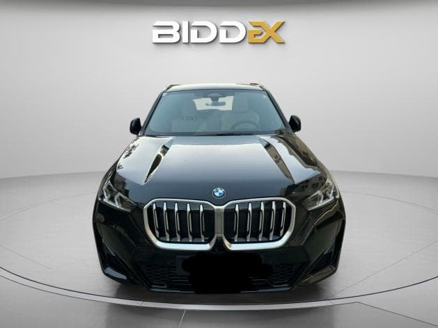 بي ام دبليو X1 2024 اي درايف أسود أوتوماتيك — مستعملة - 1