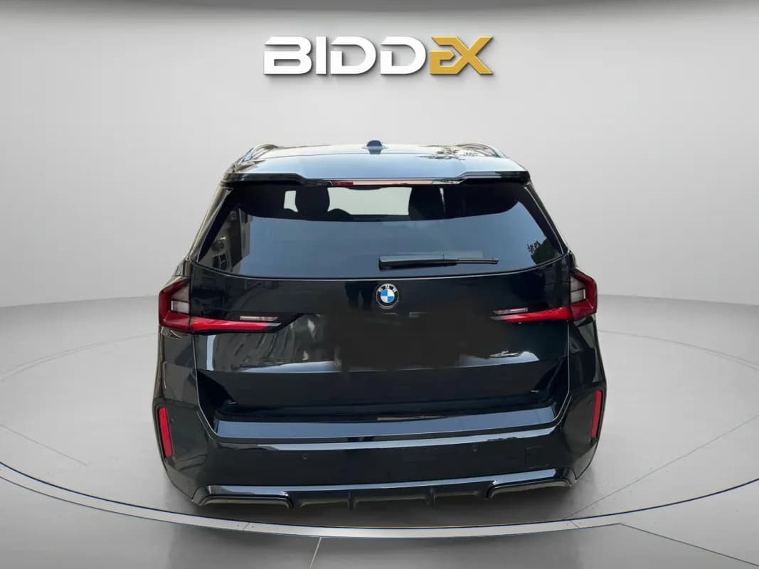 بي ام دبليو X1 2024 اي درايف أسود أوتوماتيك — مستعملة